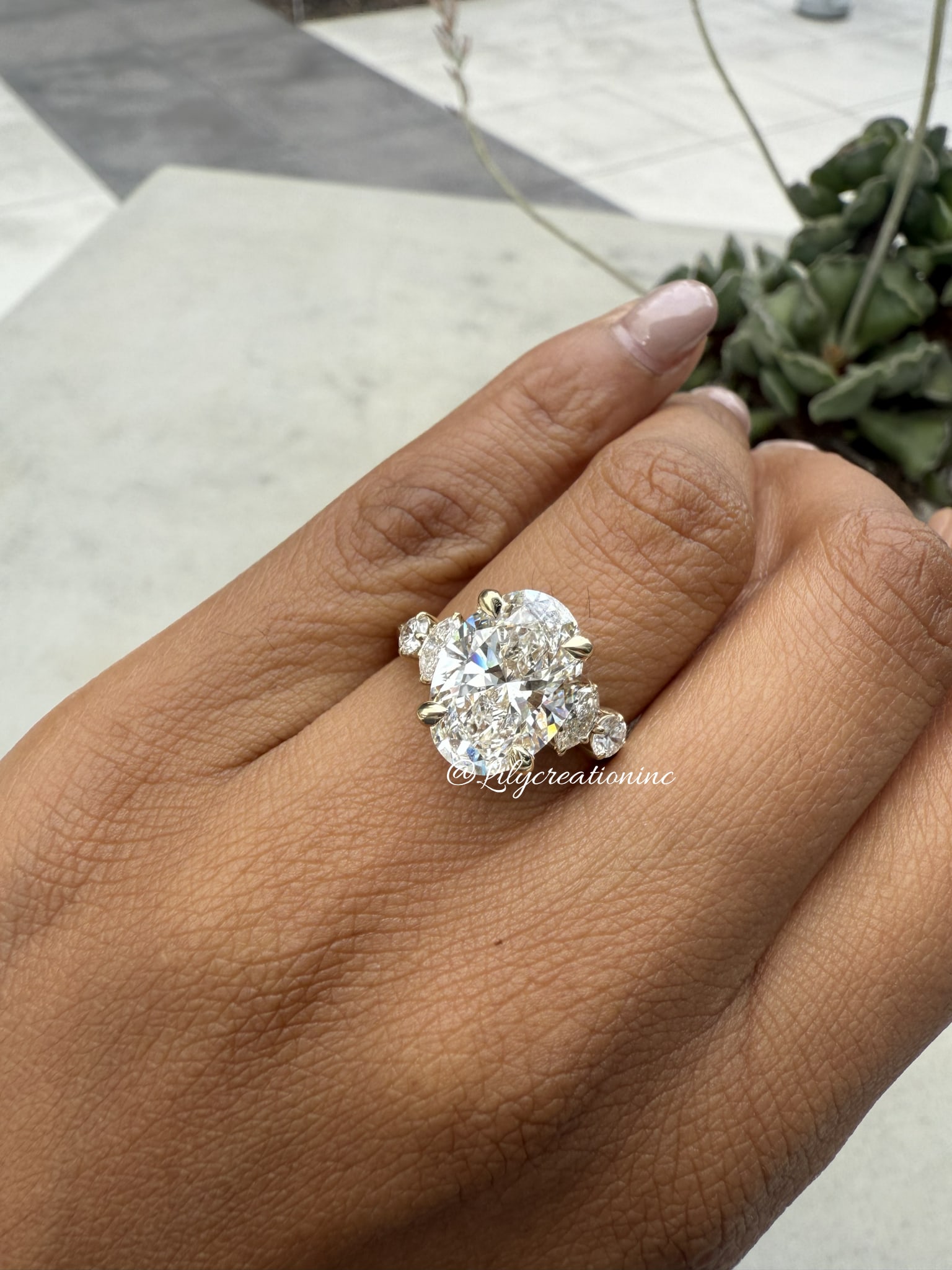 4 Carat Oval , Marquee and Round Side Stone Diamond Engagement Ring in 14k Yellow Gold: 14k Yellow Gold Oval , Marquee and Round Side Stone Diamond Engagemant Ring /Total Diamond Weight: 4 Carat / Center Stone : 4 Carat / Side Stone : 0.33 Carat Solid 14k Yellow Gold & Conflict - Free La
