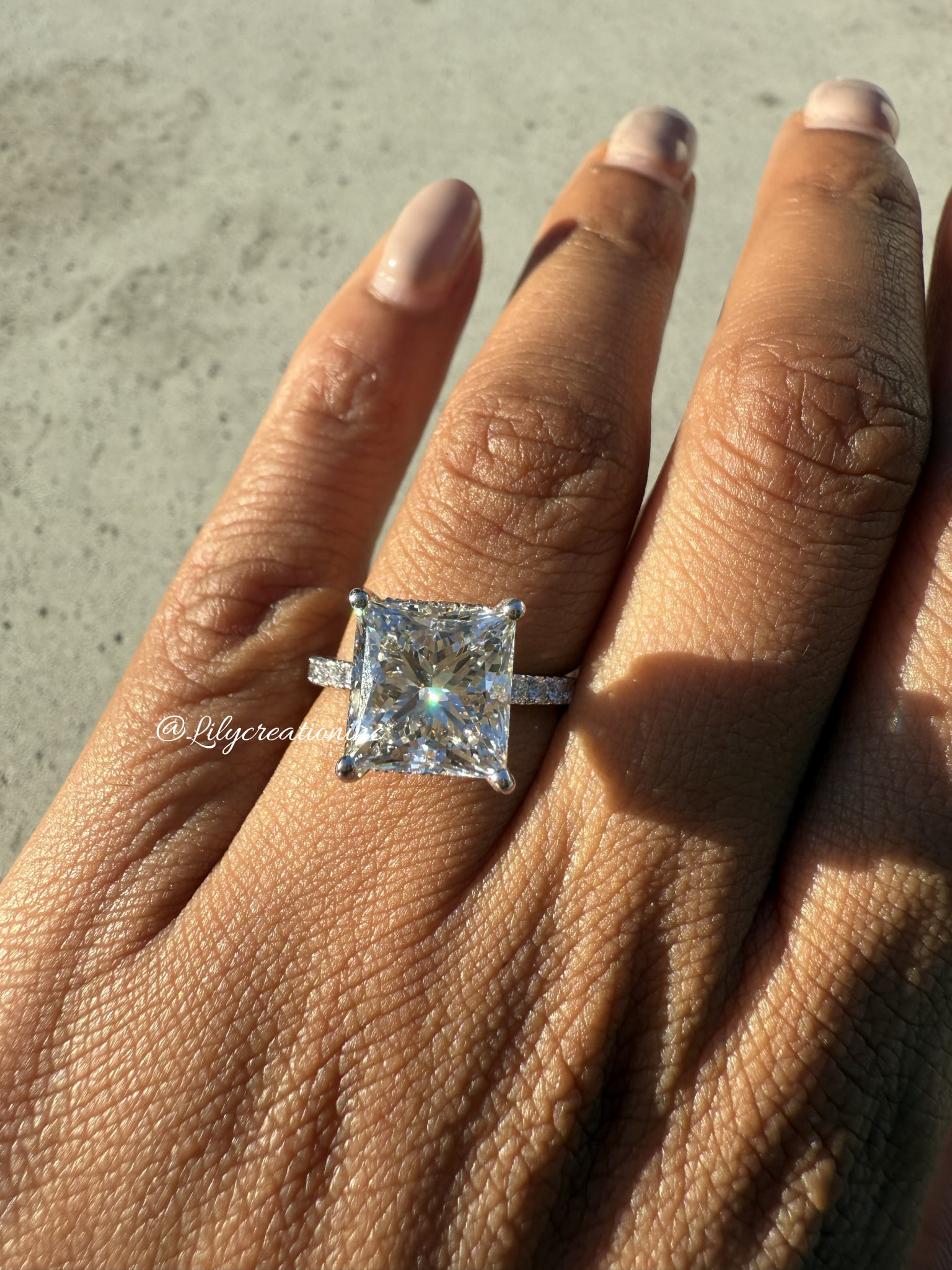 5 Carat Princess , hidden halo , 1/2 pave Diamond Engagement Ring in 14k White Gold: 14k White Gold Princess hidden halo 1/2 pave Diamond Engagemant Ring /Total Diamond Weight: 5 Carat / Center Stone : 5 Carat / Side Stone : 0.50Solid 14k White Gold & Conflict - Free Lab Grown Diamond