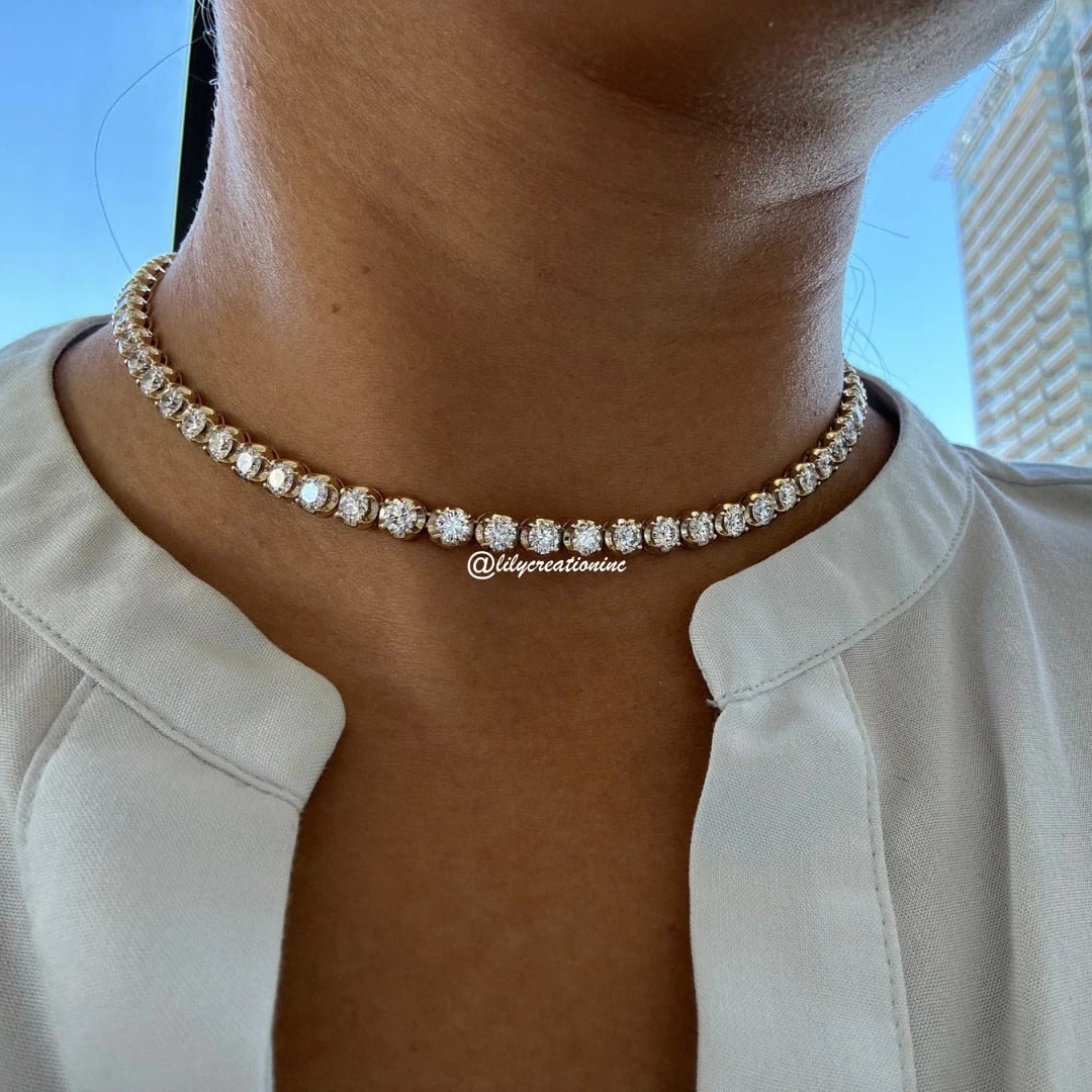 15 Carat Crown Diamond Tennis Necklace in 14k Rose Gold: 14k Rose Gold Crown Diamond Tennis Necklace /Length of the Necklace : 18 InchesTotal Diamond Weight : 15 Carat in a 18 Inch Necklace/Solid 14k Rose Gold & Conflict - Free Lab Grown Diamond/Diamond Qua