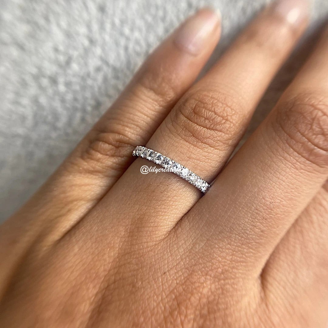 1 Carat Round Pavé Diamond Eternity Band in 14k White Gold: 14k White Gold Round Pave Diamond Eternity Band /Total Diamond Weight: 1 Carat Solid 14k White Gold & Conflict - Free Lab Grown Diamond/Diamond Quality : E in Color & VVS-VS in Clarity/Width : 2.3 mmR