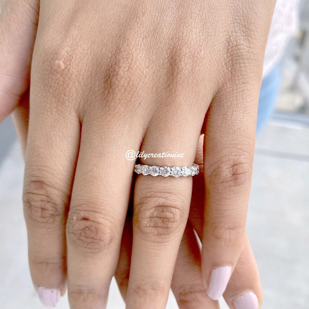 2 Carat Round Diamond Eternity Band in 14k White Gold: 14k White Gold Round Diamond Eternity Band /Total Diamond Weight: 2 Carat Solid 14k White Gold & Conflict - Free Lab Grown Diamond/Diamond Quality : E in Color & VVS-VS in Clarity/Width : 3mmRetail Va