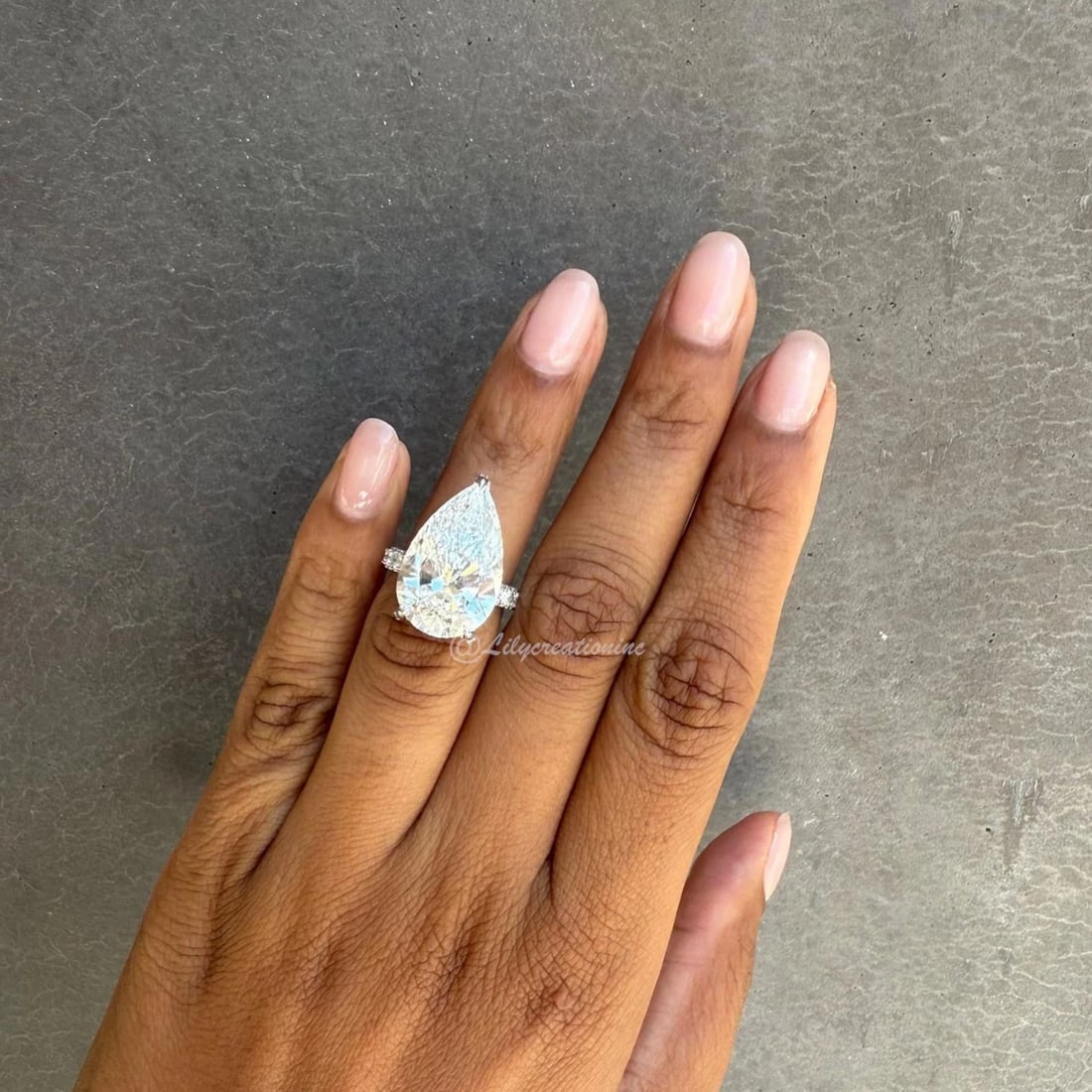 10 Carat Three-Prong Pear Cut Diamond Engagement Ring With Sid Stones in 14k White Gold: 14k White Gold Three - Prong Pear Cut with Side Stones Diamond Engagement Ring /Total Diamond Weight: 10 Carat Solid 14k White Gold & Conflict - Free Lab Grown Diamond/Diamond Quality : E in Color & V