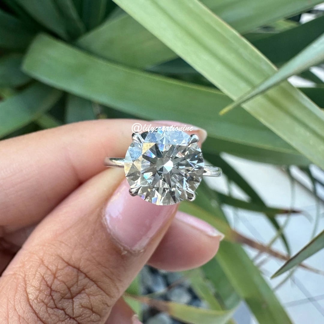 3 Carat Round Petal Diamond Engagement Ring in 14k White Gold: 14k White Gold Round Petal Diamond Engagement Ring /Total Diamond Weight: 3 Carat / Center stone : 2 Carat / Side stone : 1/10 CaratSolid 14k White Gold & Conflict - Free Lab Grown Diamond/Diamond Qua