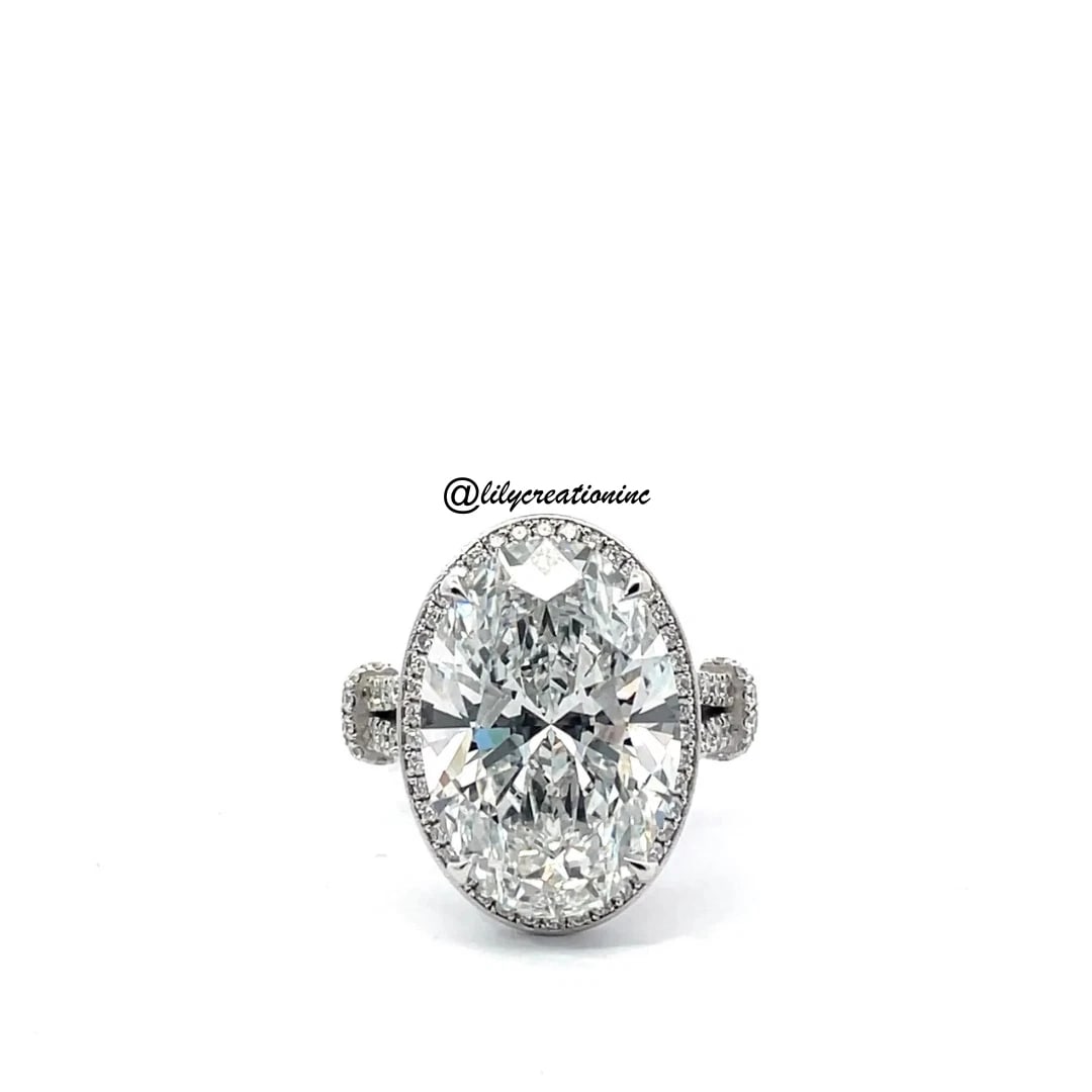 5 Ct Oval Diamond Engagement Ring With Split Shank and Pave Diamonds in 14k White Gold: 14k White Gold Oval with Split Shank and Pave Diamond Engagement Ring /Total Diamond Weight: 5 Carat / Center Stone : 4 Carat / Side Stone : 1 Carat Solid 14k White Gold & Conflict - Free Lab Grown Di