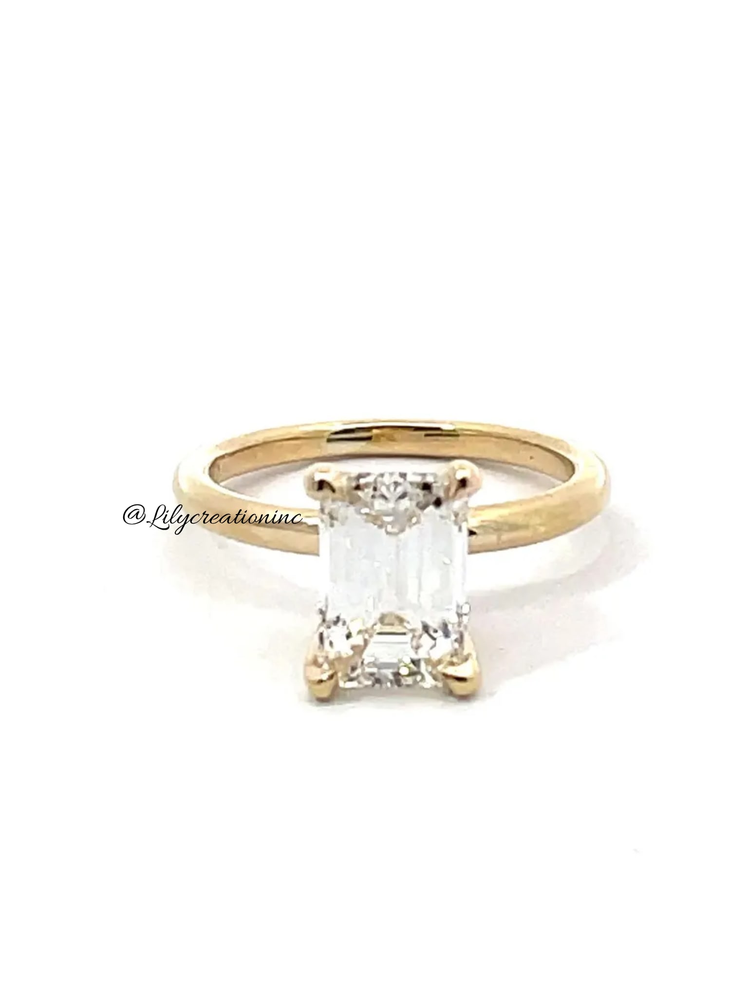 2 Carat Emerald Cut Diamond Engagement Ring in 14k Yellow Gold: 14k Yellow Gold Emerald Cut Diamond Engagement Ring /Total Diamond Weight: 2 Carat Solid 14k Yellow Gold & Conflict - Free Lab Grown Diamond/Diamond Quality : E in Color & VVS-VS in Clarity/Certificat