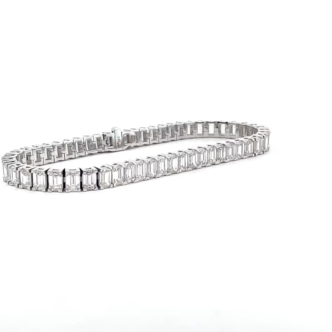 14 Carat Emerald North to South Diamond Tennis Bracelet in 14k White Gold: 14k White Gold Emerald North to South Diamond Tennis Bracelet/Length of the Bracelet: 7 Inches/Total Diamond Weight: 14 Carat in a 7 inch Bracelet/Solid 14K White Gold and Conflict free Lab grown Diam