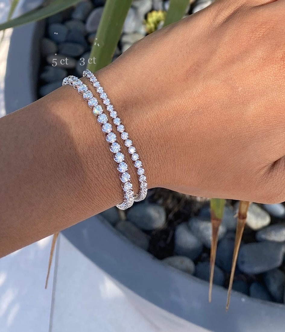 5 Carat Round Illusion Diamond Tennis Bracelet in 14k White Gold: 14k White Gold Round Illusion Diamond Tennis Bracelet/Length of the Bracelet: 7 Inches/Total Diamond Weight: 5 Carat in a 7 inch Bracelet/Solid 14K White Gold and Conflict free Lab grown Diamonds/Diam