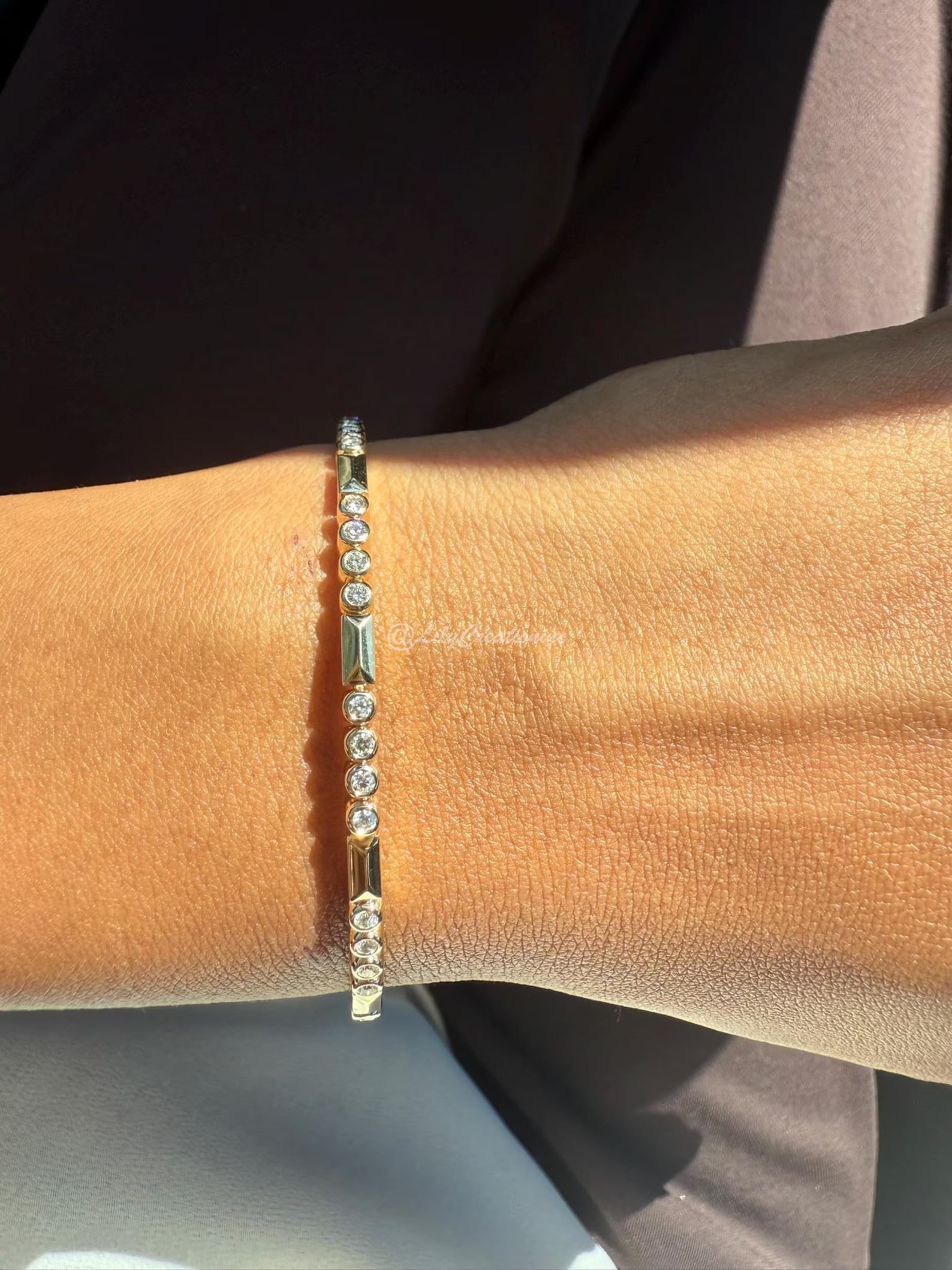 1/2 Carat Round Unique Flexible Diamond Bangle in 14k Yellow Gold: 14k Yellow Gold Round Unique Flexible Diamond Tennis Bangle/Length of the Bracelet: 7 Inches/Total Diamond Weight: 1/2 Carat in a 7 inch Bracelet/Solid 14K Yellow Gold and Conflict free Lab grown Diam