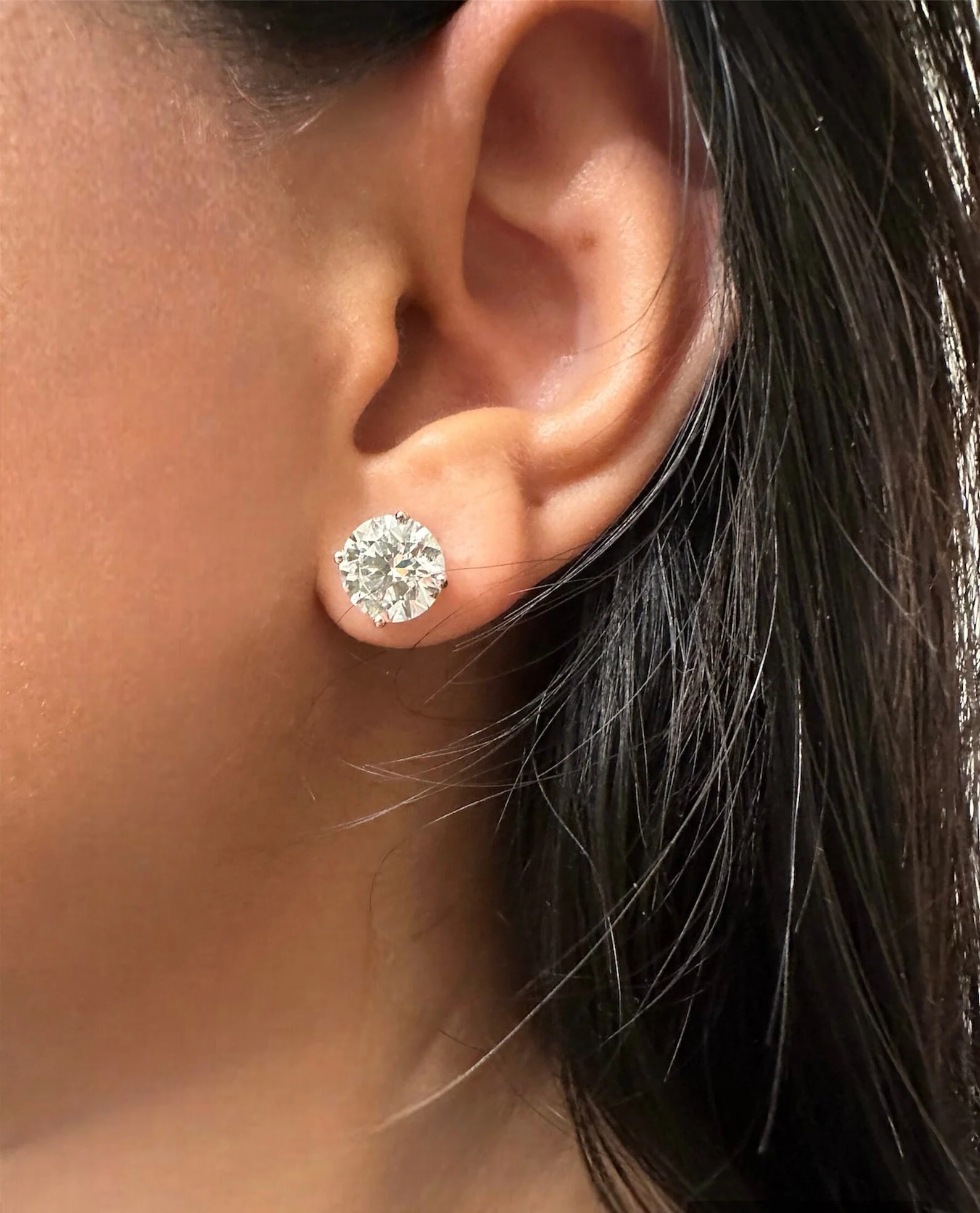 4 Prong 10 Carat Round Stud Diamond Earrings in 14k White Gold: 14k White Gold 4 Prong Round Diamond Stud Earrings/Total Diamond Weight: 10 CaratSolid 14K White Gold and Conflict free Lab grown Diamonds/Diamond Quality: E In Color & VVS-VS In Clarity/Width : mmBac
