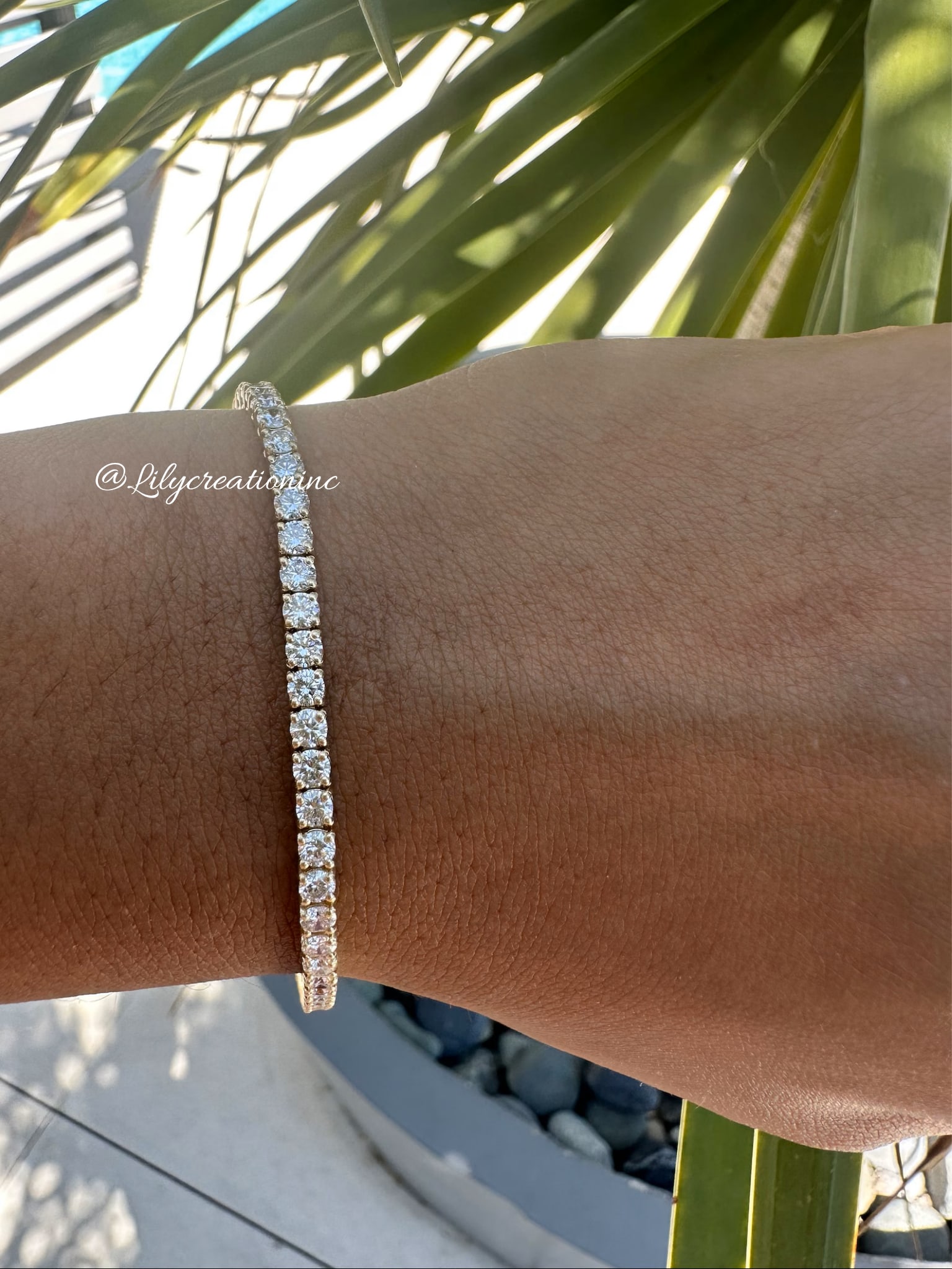 6 Carat Round Diamond Tennis Bracelet in 14k Yellow Gold: 14k Yellow Gold Round Diamond Tennis Bracelet/Length of the Bracelet: 7 Inches/Total Diamond Weight: 6 Carat in a 7 inch Bracelet/Solid 14K Yellow Gold and Conflict free Lab grown Diamonds/Diamond Qua