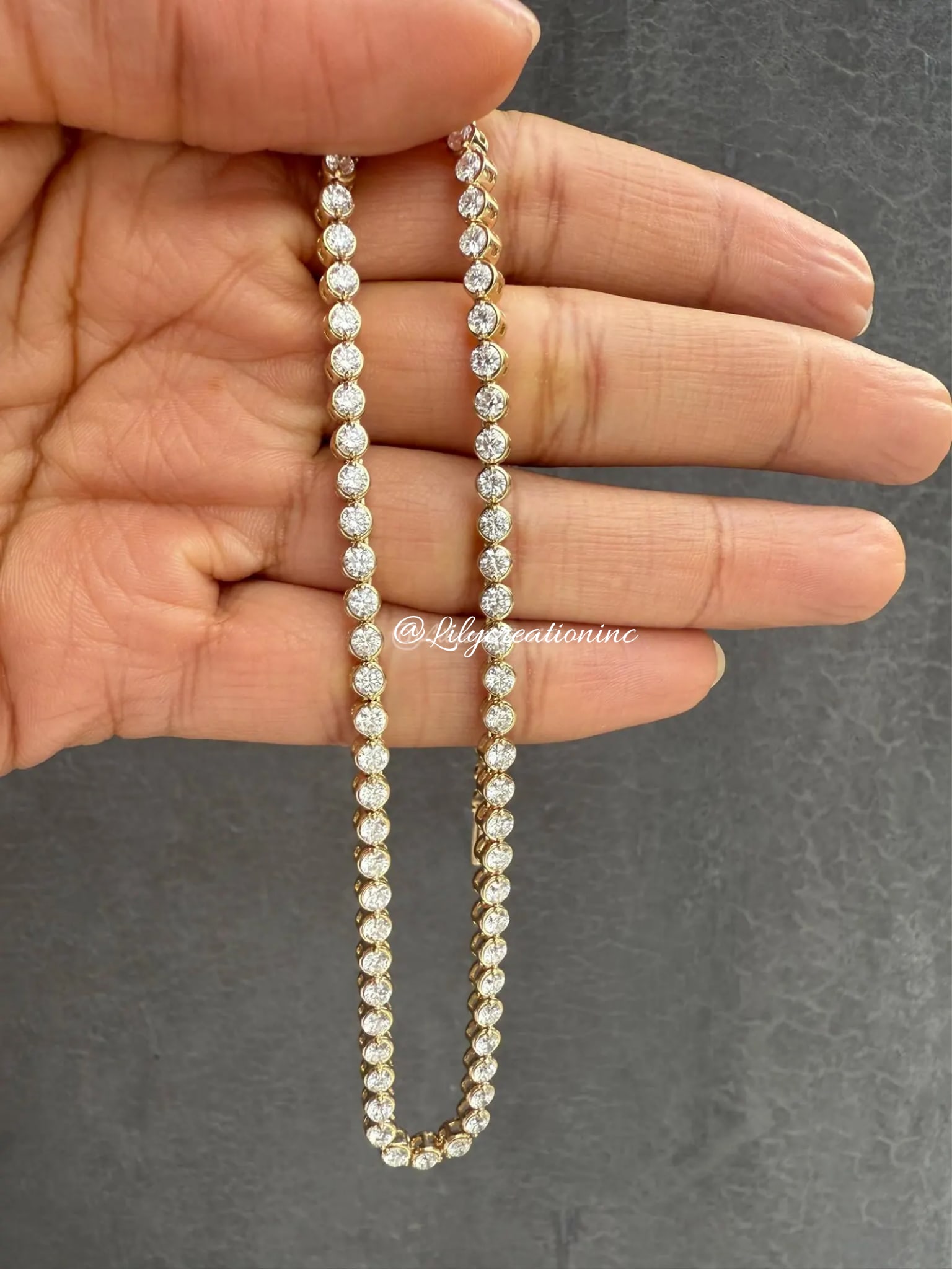 7 Carat Round Bezel Set Diamond Tennis Necklace in 14k Yellow Gold: 14k Yellow Gold Round Bezel Set Diamond Tennis Necklace /Length of the Necklace : 18 InchesTotal Diamond Weight : 7 Carat in a 18 Inch Necklace/Solid 14k Yellow Gold & Conflict - Free Lab Grown Diamon