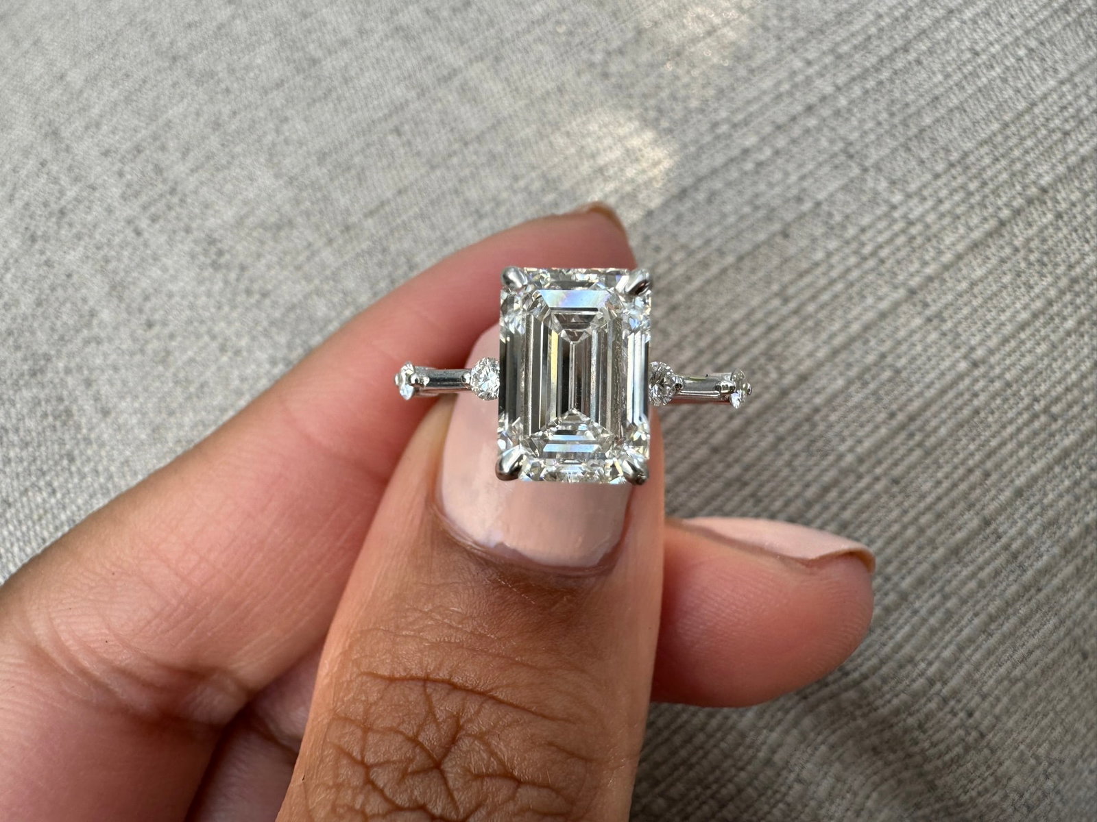 3 Carat Emerald Cut Diamond Engagement Ring W/ Side Stones in 14k White Gold: 14k White Gold Emerald Cut with Side Stones Diamond Engagemant Ring /Total Diamond Weight: 2 Carat / Side Stones: 0.10 CaratSolid 14k White Gold & Conflict - Free Lab Grown Diamond/Diamond Quality : E