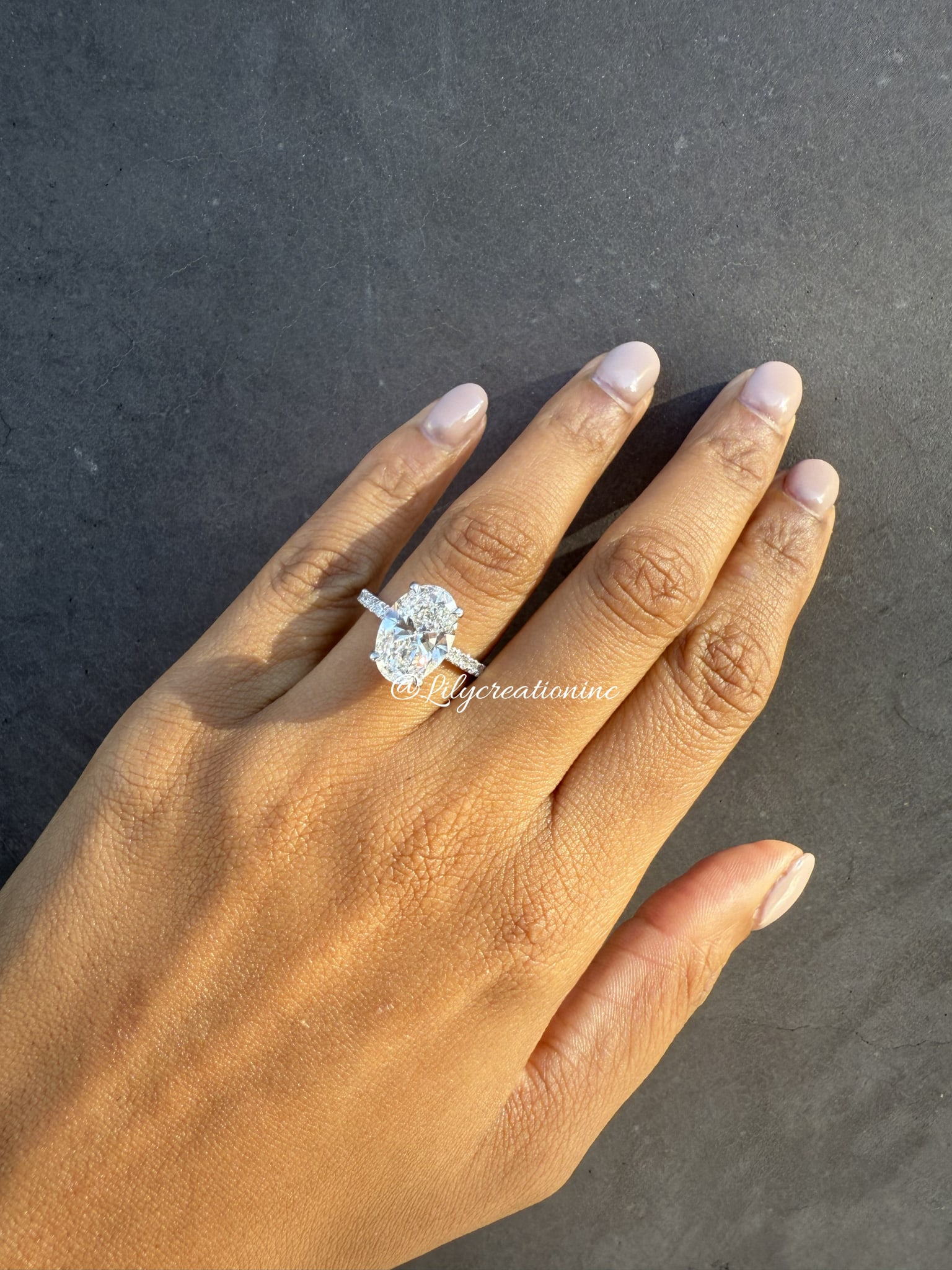 4 Carat Oval with Side Pave Diamond Engagement Ring in 14k White Gold: 14k White Gold Oval with Side Pave Diamond Engagemant Ring /Total Diamond Weight: 4 Carat / Center Stone : 4 Carat / Side Stone : 0.40 CaratSolid 14k White Gold & Conflict - Free Lab Grown Diamond/Dia