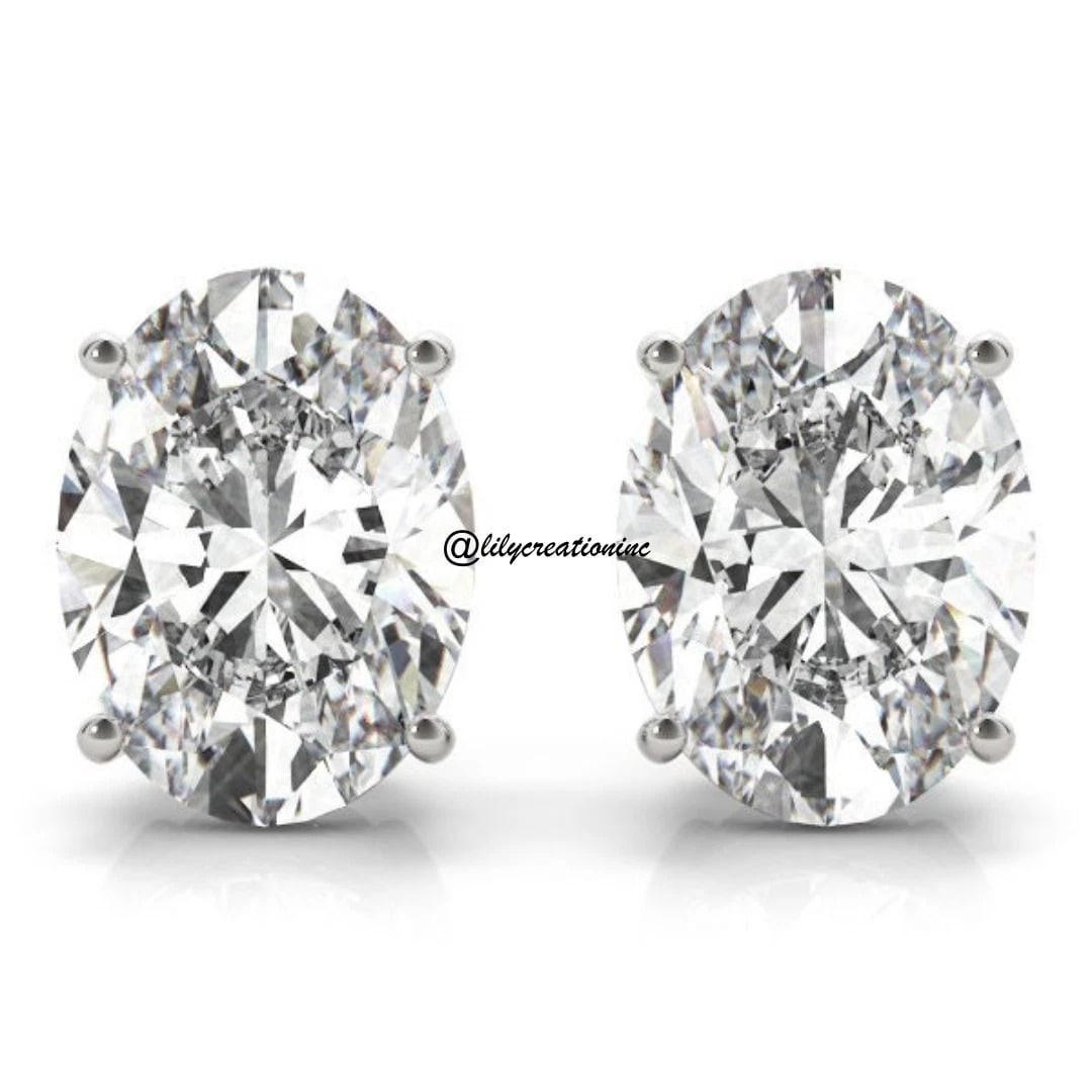 2 Carat Oval Diamond Stud Earring in 14k White Gold: 14k White Gold Oval Diamond Stud Earrings/Total Diamond Weight: 2 CaratSolid 14K White Gold and Conflict free Lab grown Diamonds/Diamond Quality: E In Color & VVS-VS In Clarity/Width: mmBacking: Push 