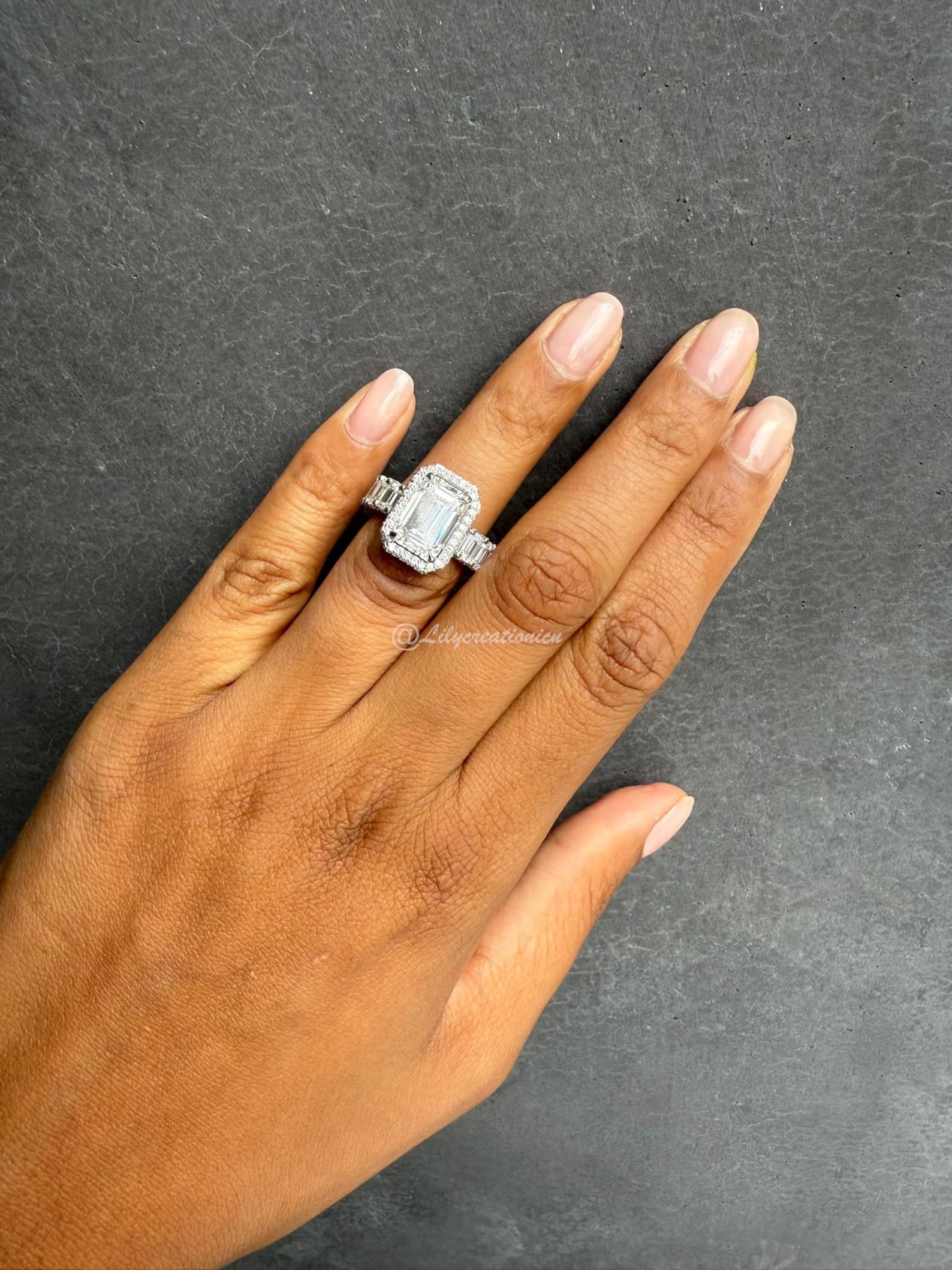 9 Carat Emerald Cut Eternity Diamond Engagement Ring in 14k White Gold: 14k White Gold Emerald Cut Diamond Engagement Ring /Total Diamond Weight: 9 Carat / Center Stone : Carat / Side Stone : Carat Solid 14k White Gold & Conflict - Free Lab Grown Diamond/Diamond Quality :