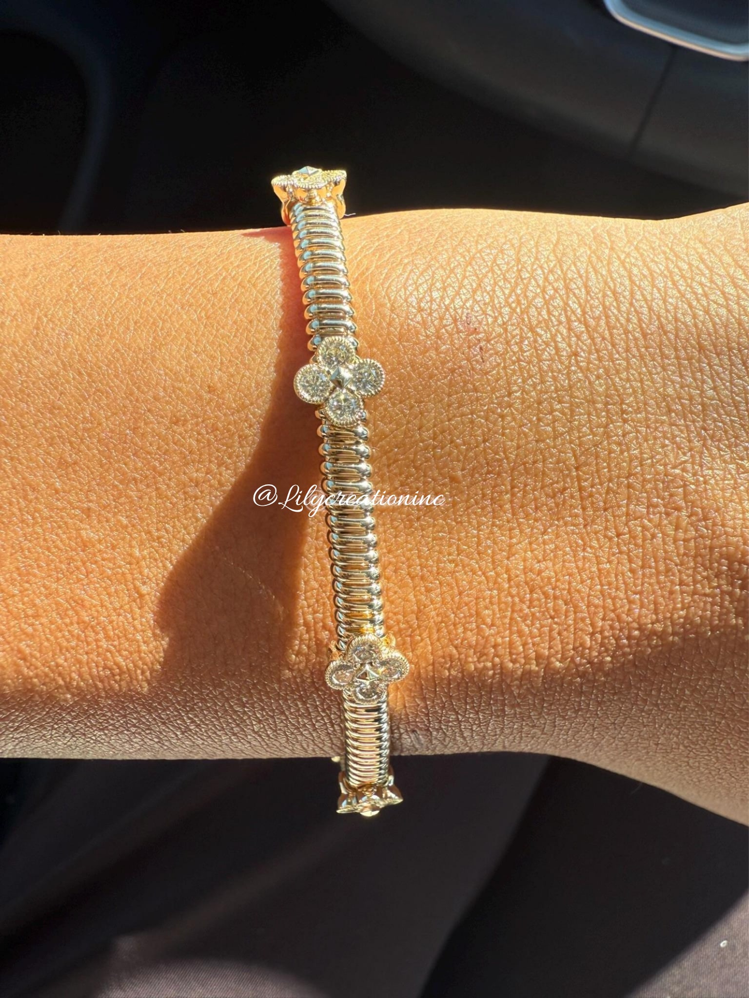 1/2 Carat Round Flower Flexible Diamond Bangle in 14k Yellow Gold: 14k Yellow Gold Round Flower Flexiable Diamond Tennis Bracelet/Length of the Bracelet: 7 Inches/Total Diamond Weight: 1/2 Carat in a 7 inch Bracelet/Solid 14K Yellow Gold and Conflict free Lab grown D