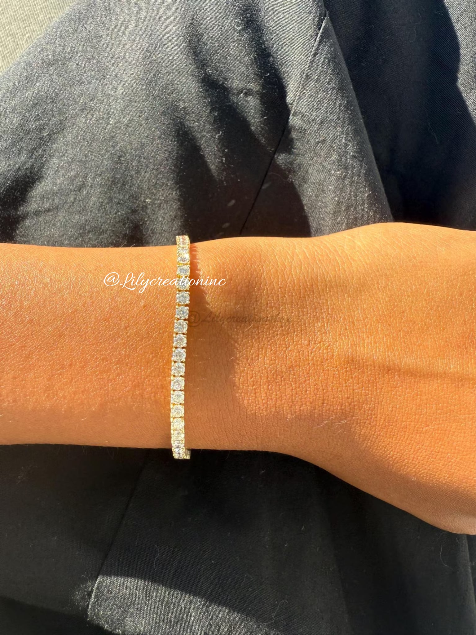 2 Carat Round Diamond Tennis Bracelet in 14k Yellow Gold: 14k Yellow Gold Round Diamond Tennis Bracelet/Length of the Bracelet: 7 Inches/Total Diamond Weight: 2 Carat in a 7 inch Bracelet/Solid 14K Yellow Gold and Conflict free Lab grown Diamonds/Diamond Qua