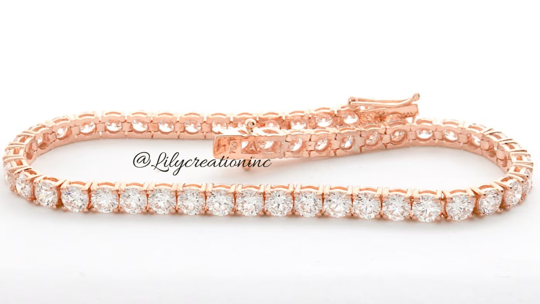 12 Carat Round Diamond Tennis Bracelet in 14k Rose Gold: 14k Rose Gold Round Diamond Tennis Bracelet/Length of the Bracelet: 7 Inches/Total Diamond Weight: 12 Carat in a 7 inch Bracelet/Solid 14K Rose Gold and Conflict free Lab grown Diamonds/Diamond Qualit