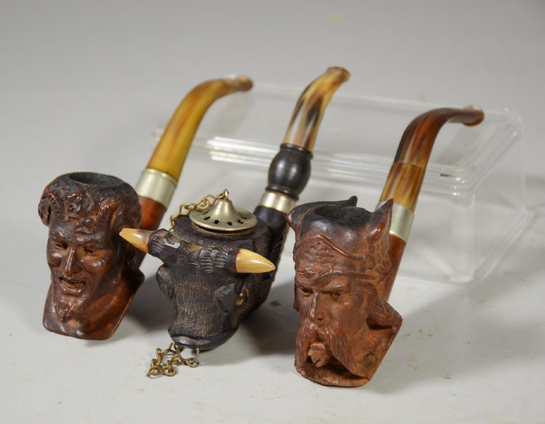Three (3) carved Meerschaum type pipes, one of a Viking (1 of 4)