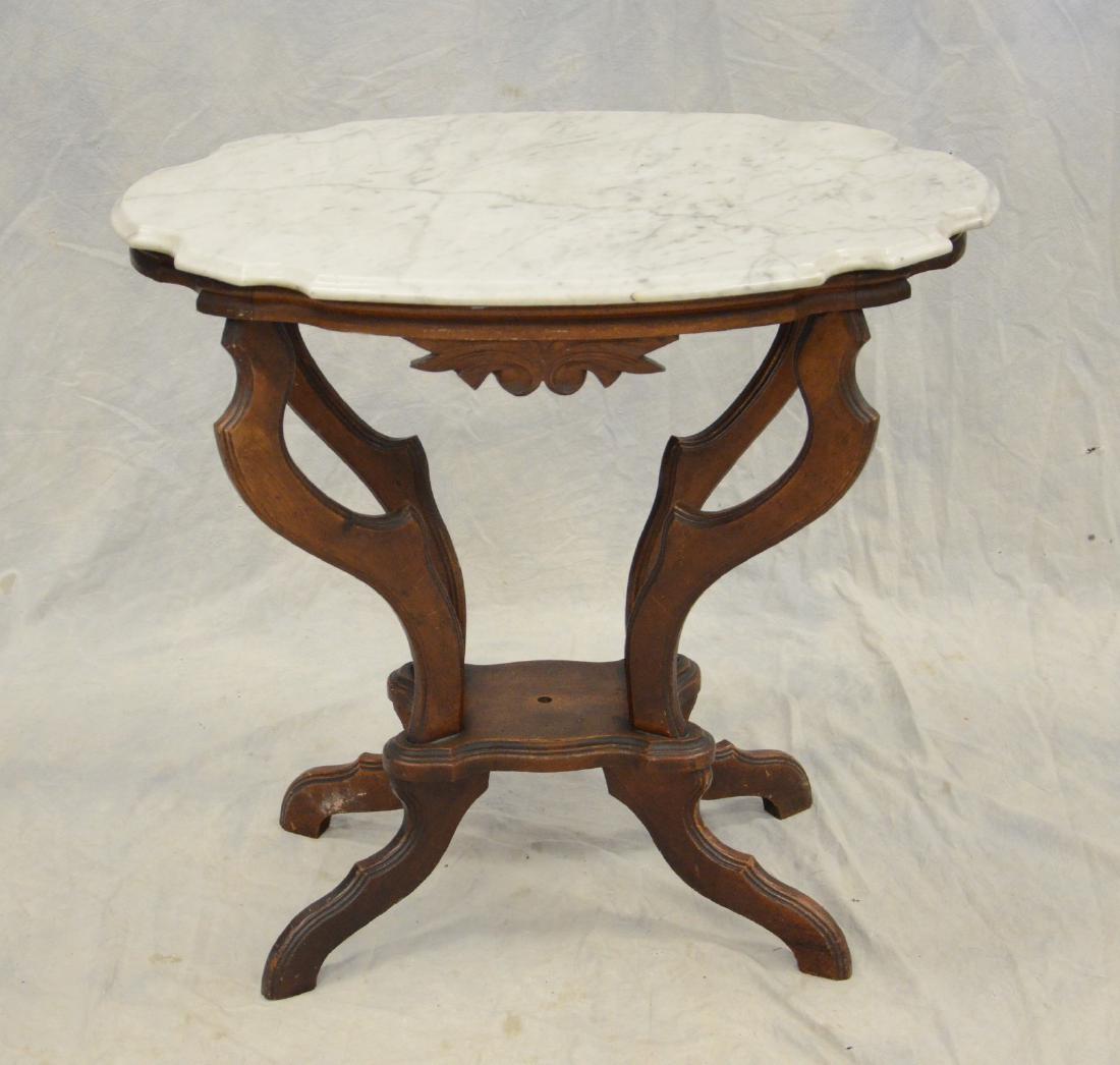 Walnut Victorian turtle shaped marble top table (1 of 2)