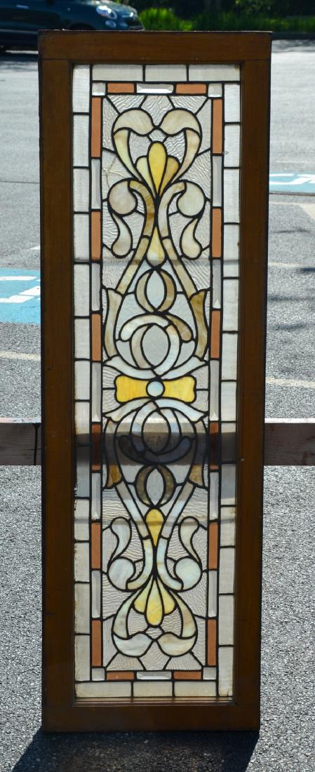 Stained glass transom: Stained glass transom, clear and amber glass, some jewels, 53 1/2" x 17"