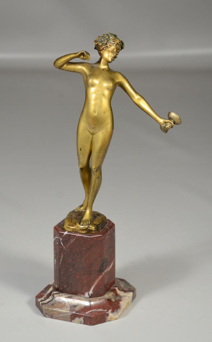 Hans Keck, German bronze sculpture nude holding a cup: Hans Keck, German, early 20th c, bronze sculpture of a nude holding a cup, on a brown marble pedestal base, right arm with tight repair, 11" tall