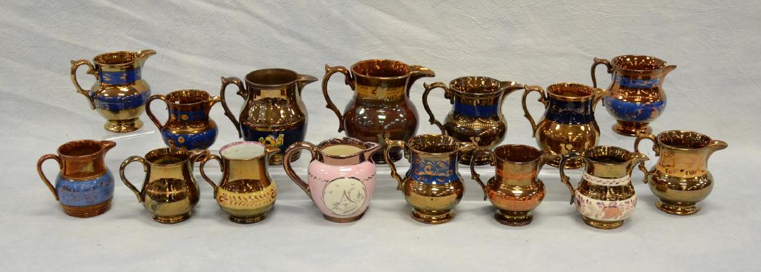 Collection of (15) copper lustre pitchers (1 of 3)