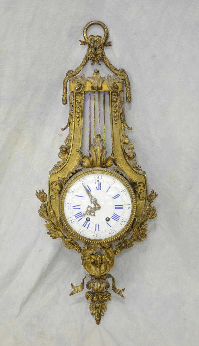 Antique  French gilt  bronze lyre  form cartel clock  Antique  French gilt  bronze lyre  form cartel clock