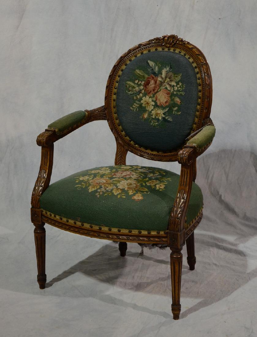 Louis XVI style walnut carved Aubusson armchair: Louis XVI style walnut carved Aubusson armchair, walnut carved frame, Aubusson floral upholstery, 36 1/4"h. x 24 1/2"w. x 25"d.