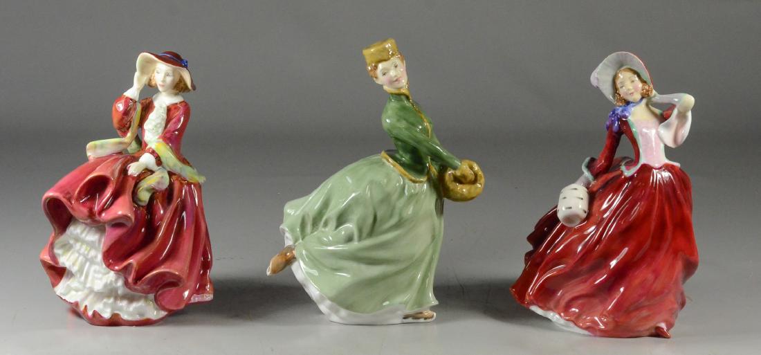 (3) Royal Doulton figurines, to include "Grace" HN: (3) Royal Doulton figurines, to include "Grace" HN 2318, "Top O' the Hill" HN 1834, and "Autumn Breezes" HN 1941