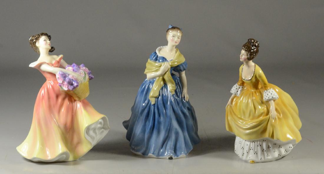 (3) Royal Doulton figurines, to include "Adrienne" HN: (3) Royal Doulton figurines, to include "Adrienne" HN 2304, "Lesley" HN 2410, and "Caroline" HN 2307