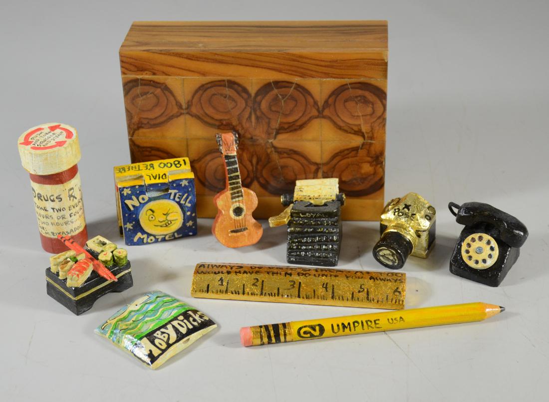 (11) Fantasy carved and painted wooden whistles and: (11) Fantasy carved and painted wooden whistles and sculptures signed CAW Roberts to include a Prescription bottle, a pencil, a guitar, typewriter, ruler, bottle, telephone, sushi bento, Moby Dick and