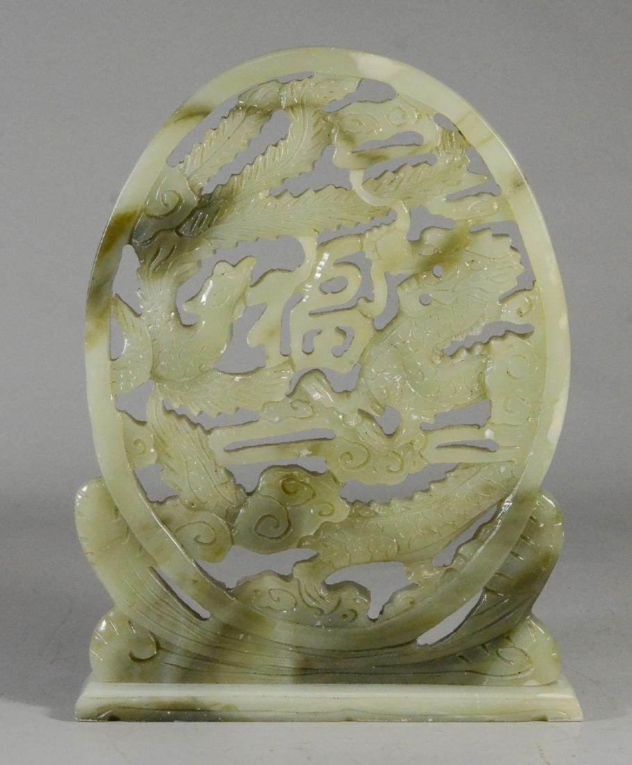 Chinese carved stone plaque of phoenix and dragon,: Chinese carved stone plaque of phoenix and dragon, minor chipping to edges, 12 1/4"h