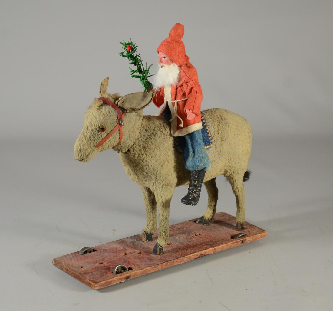 Santa Claus riding donkey pull toy, noisemaker head - (1 of 6)