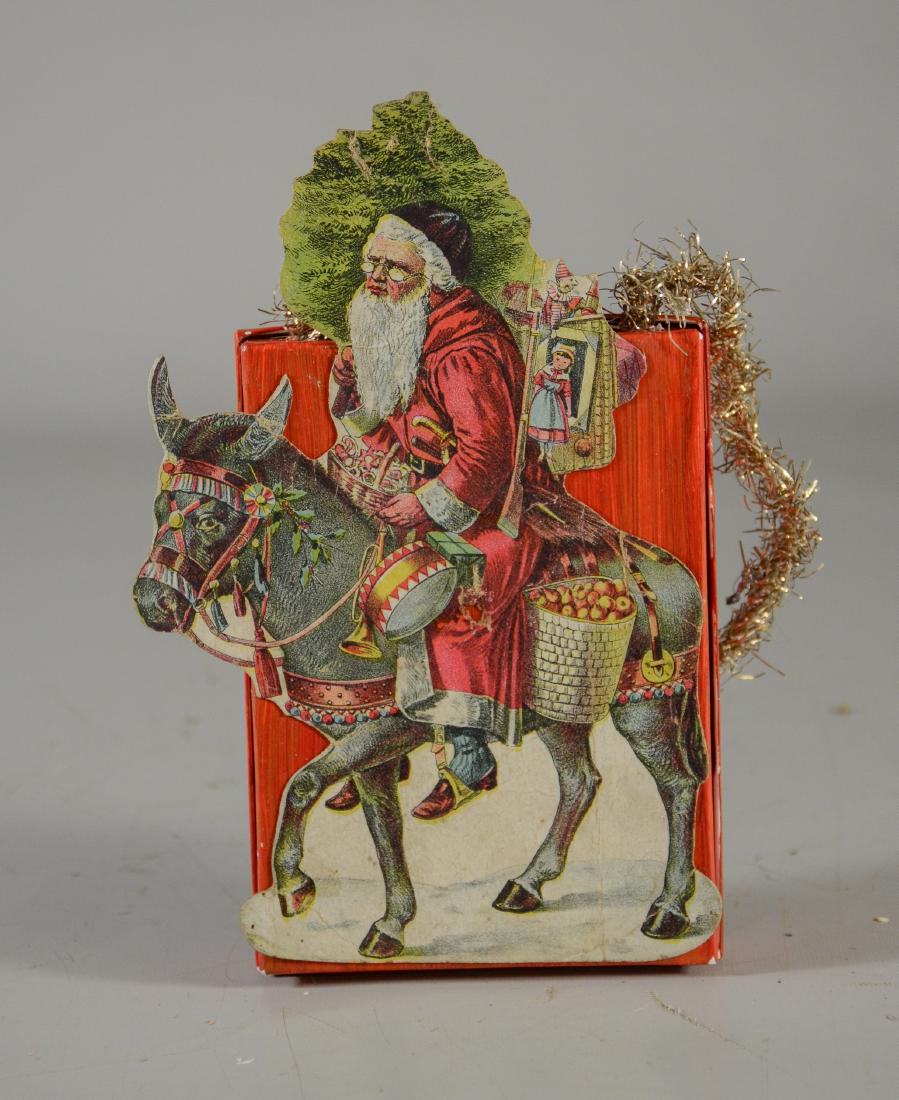 Die cut, Santa Claus on donkey w/ candy container, (1 of 3)