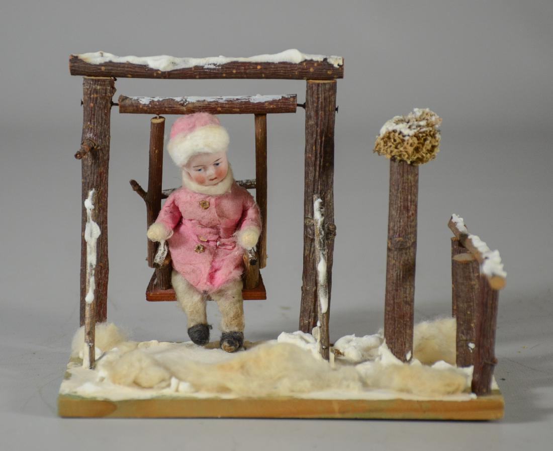 Putz snow scene with Heubach child, swing and tree (c. (1 of 4)