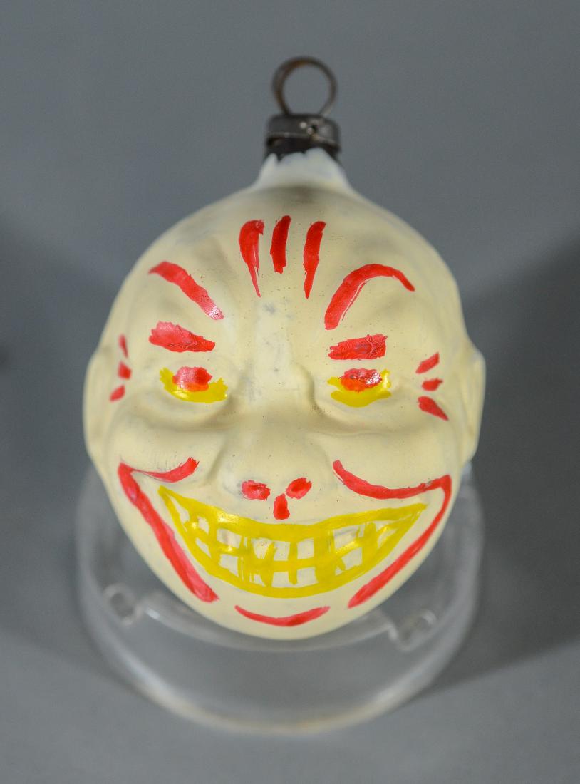 Glass white clown head, red and yellow highlights (1 of 3)