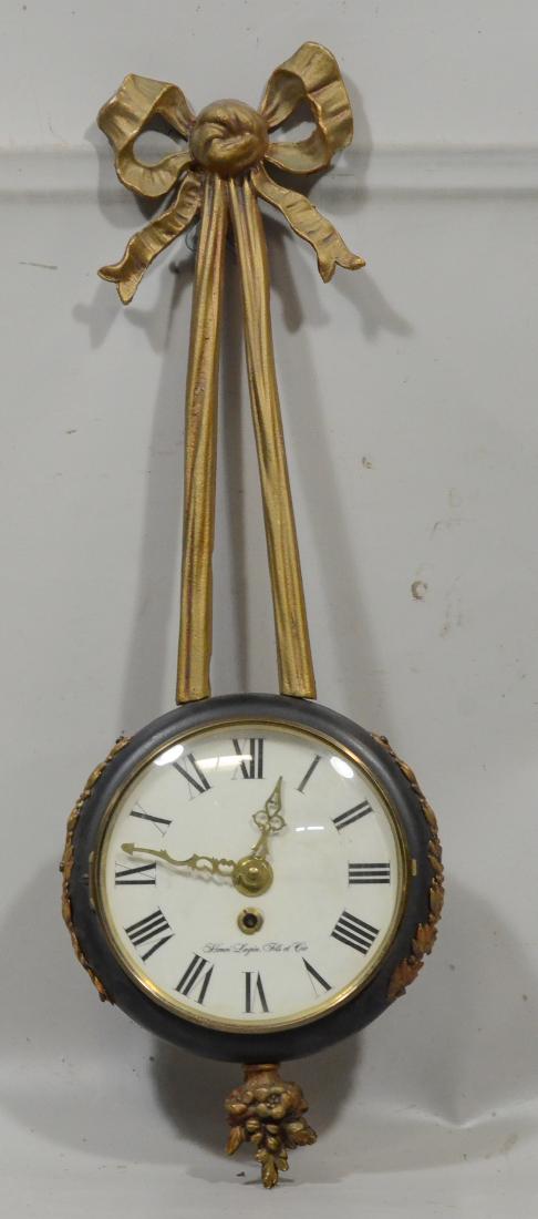 French wall clock, with circular dial with elaborate (1 of 3)
