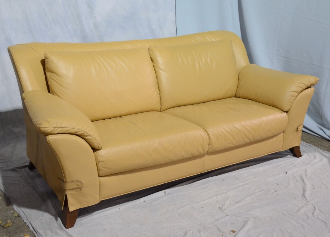 Natuzzi brown leather sofa, brown leather, wood feet,: Natuzzi brown leather sofa, brown leather, wood feet, 34 1/2"h x 84"w x 38"d, light wear to leather