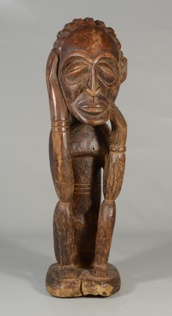 African Chokwe carved wood seated figure, Angola or the (1 of 4)