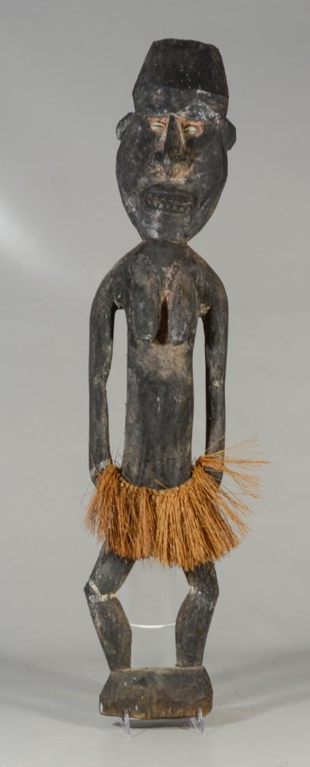 Archaic New Guinea female spirit figure, carved with (1 of 2)