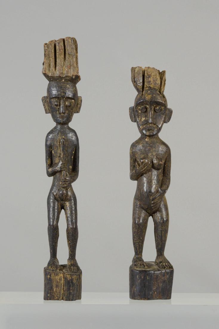 (2) Indonesian Dayak carved wood figures, male & (1 of 2)