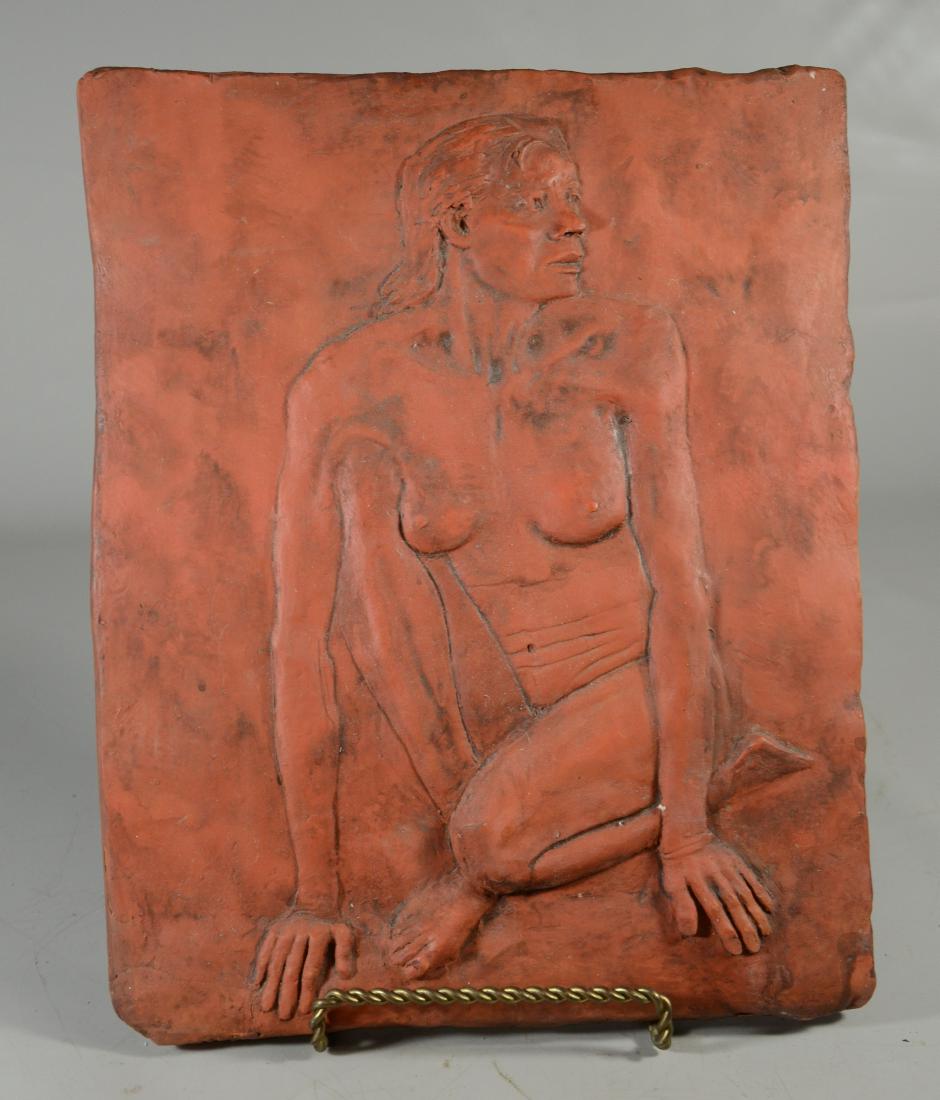 Art pottery, ceramic relief plague depicting a crouched: Art pottery, ceramic relief plague depicting a crouched female nude, terracotta, unsigned. 13" by 17"