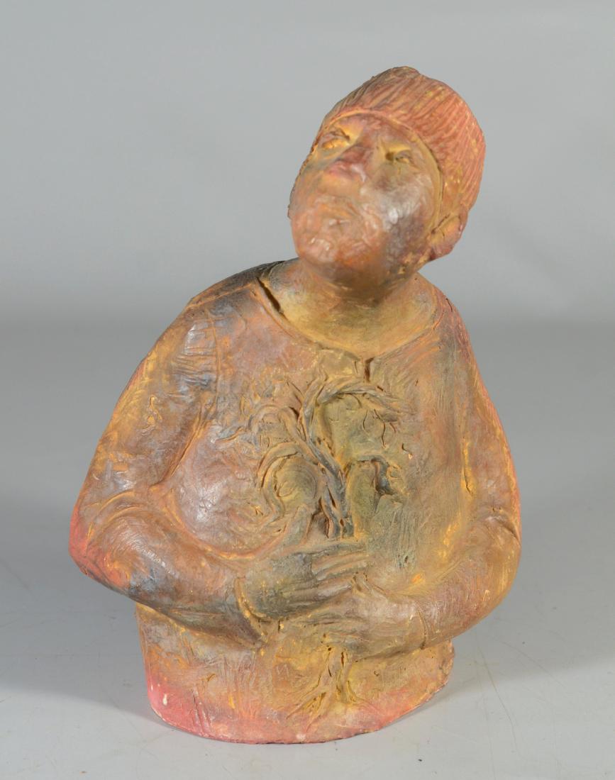 Hand built Ceramic of man holding a sapling tree with (1 of 3)