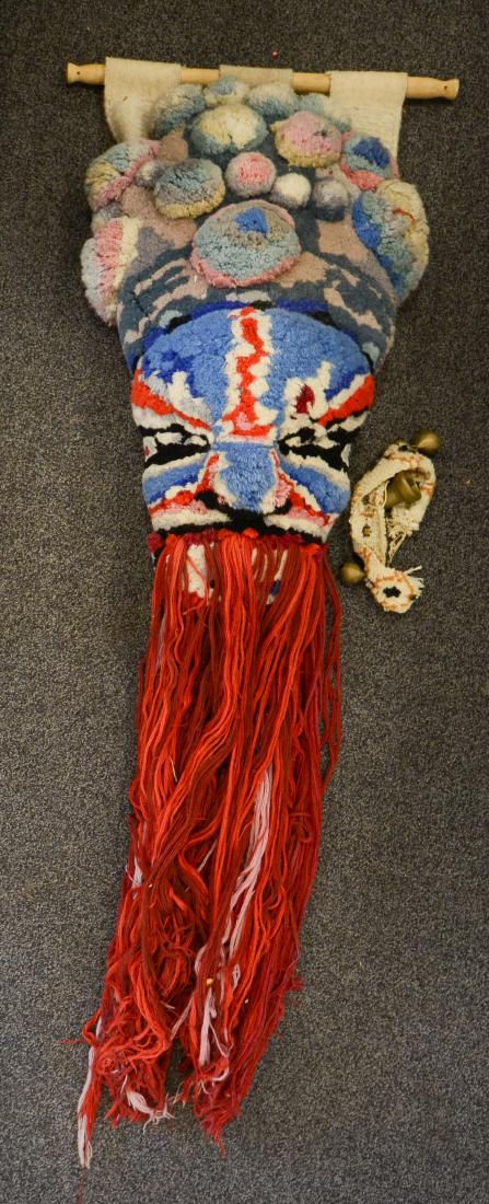 (2) Wool Pom Pom wall hanging of an Asian mask with (1 of 1)