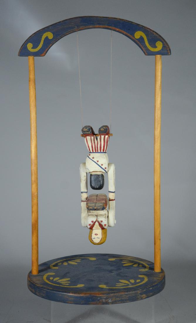 Wolf Creek acrobatic sculpture with distressed paint,: Wolf Creek acrobatic sculpture with distressed paint, mark to base, 20" h