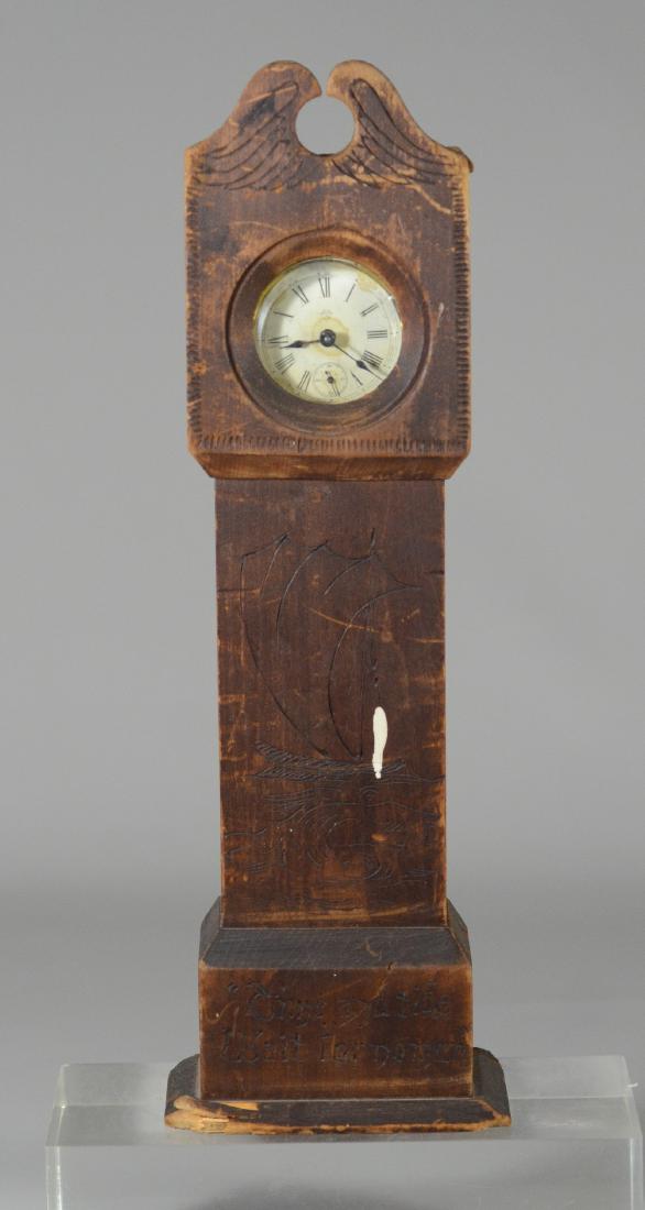 Primitive carved wood watch holder, modeled as a (1 of 2)