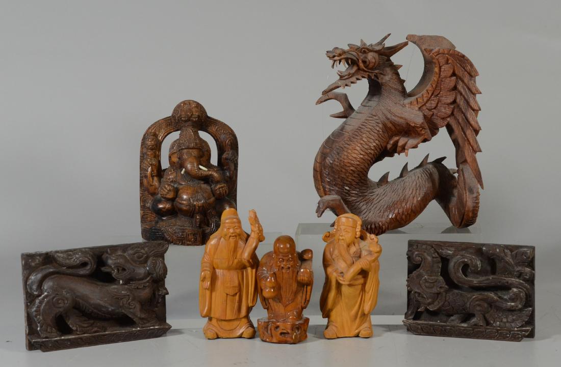 (7) Asian wood carvings to include an Indonesian winged: (7) Asian wood carvings to include an Indonesian winged dragon, a figure of Ganesh with broken tusk, 3 wise men and 2 stylized dragon plaques, tallest 8-1/4" h