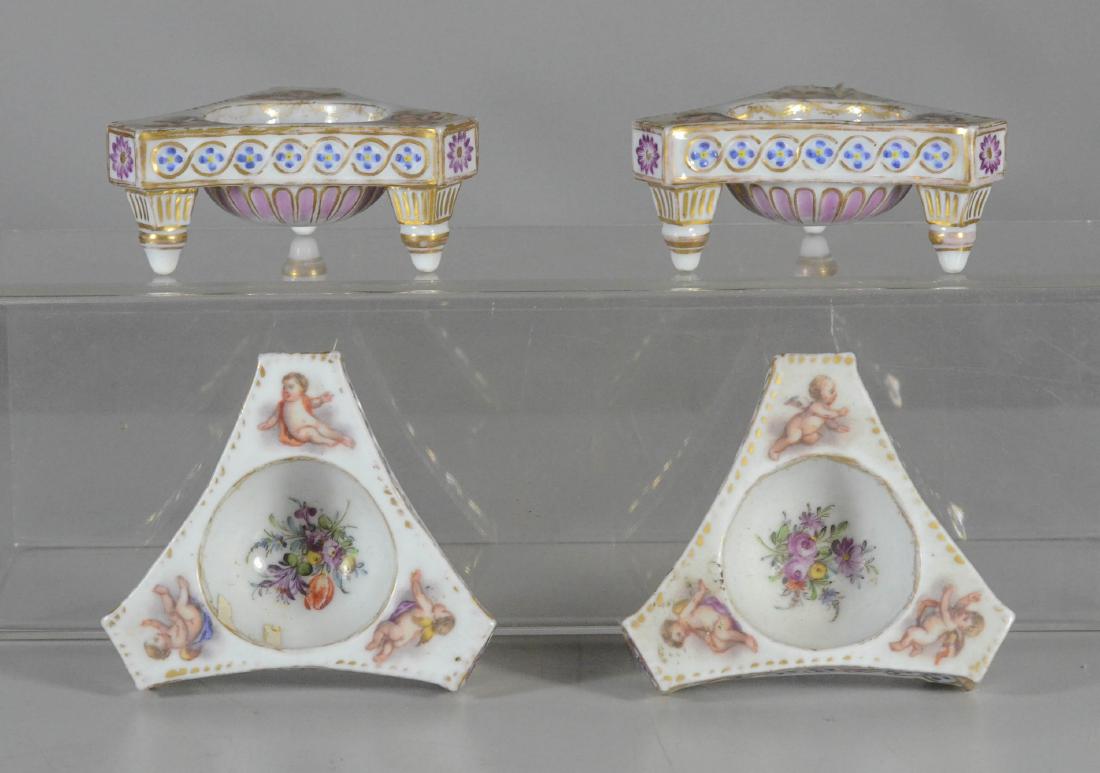 (4) Dresden trefoil footed salt cellars: (4) Dresden trefoil footed salt cellars, with underglaze blue crowned 'D' mark, Minor wear to gilding on all pieces consistent with age and use