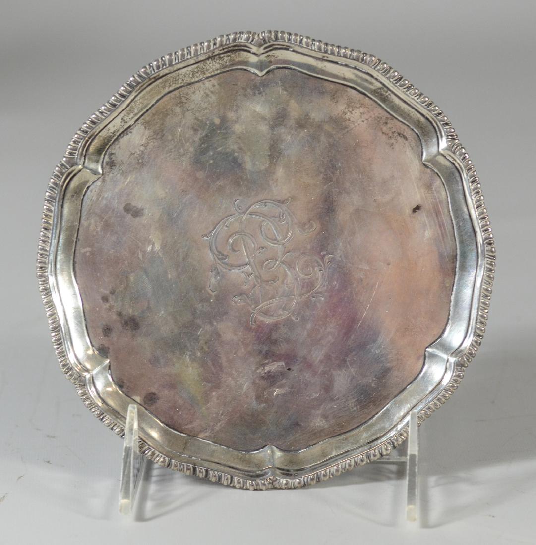 George III sterling silver round salver, London, 1771: George III sterling silver round salver, London, 1771, maker RR (could be Robert Rogers), gadrooned edge, pad feet, 6" d, dated 1793 on bottom, 7.80 TO, a bit of tarnish